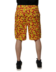 Dolce & Gabbana Gelbe Baumwoll-Bermudashorts für Herren mit Kirschprint