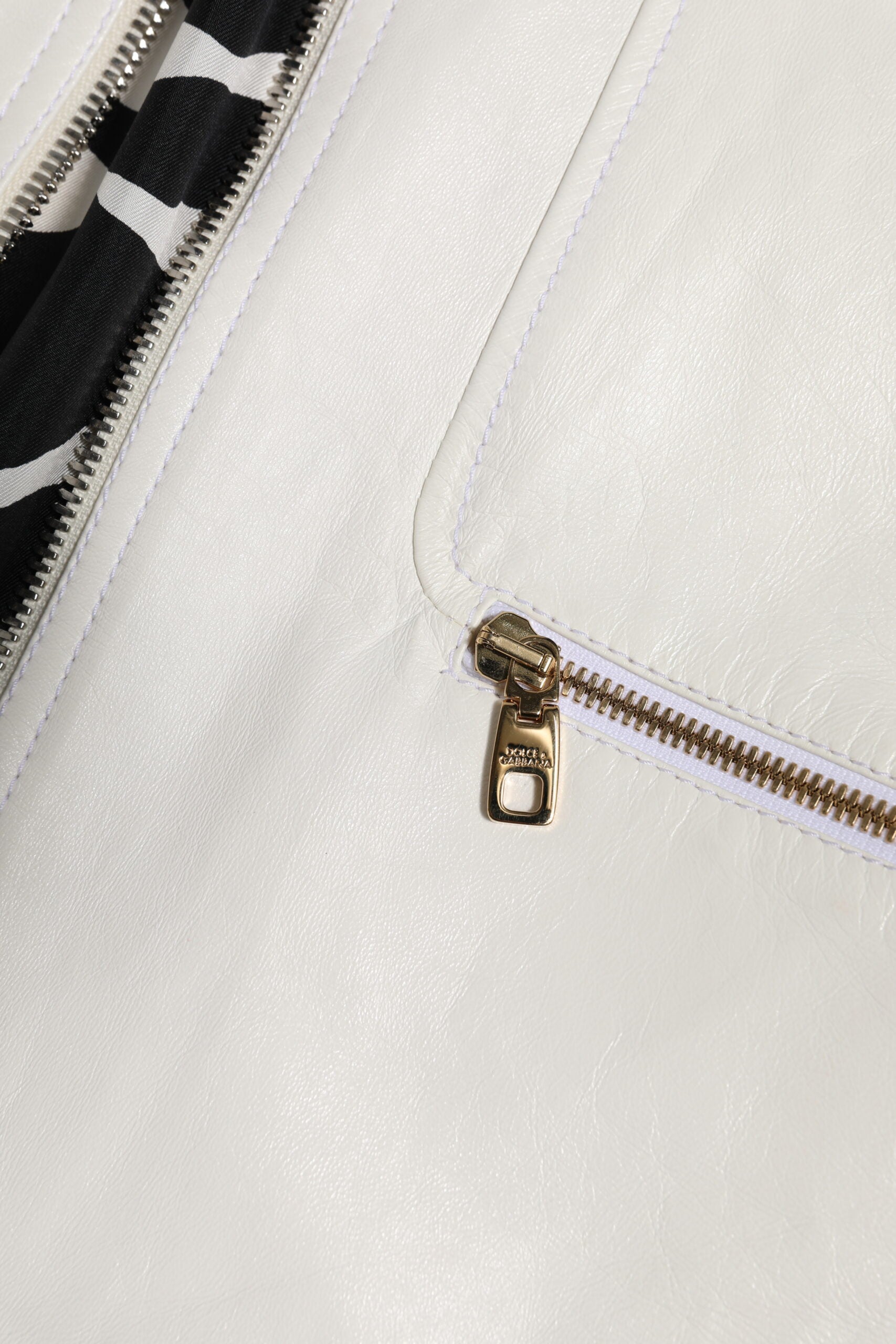 Dolce & Gabbana Weiße Bikerjacke mit Kragen und durchgehendem Reißverschluss