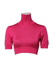 Dolce & Gabbana Pinker Seidengestrickter Rollkragenpullover als bauchfreies Oberteil