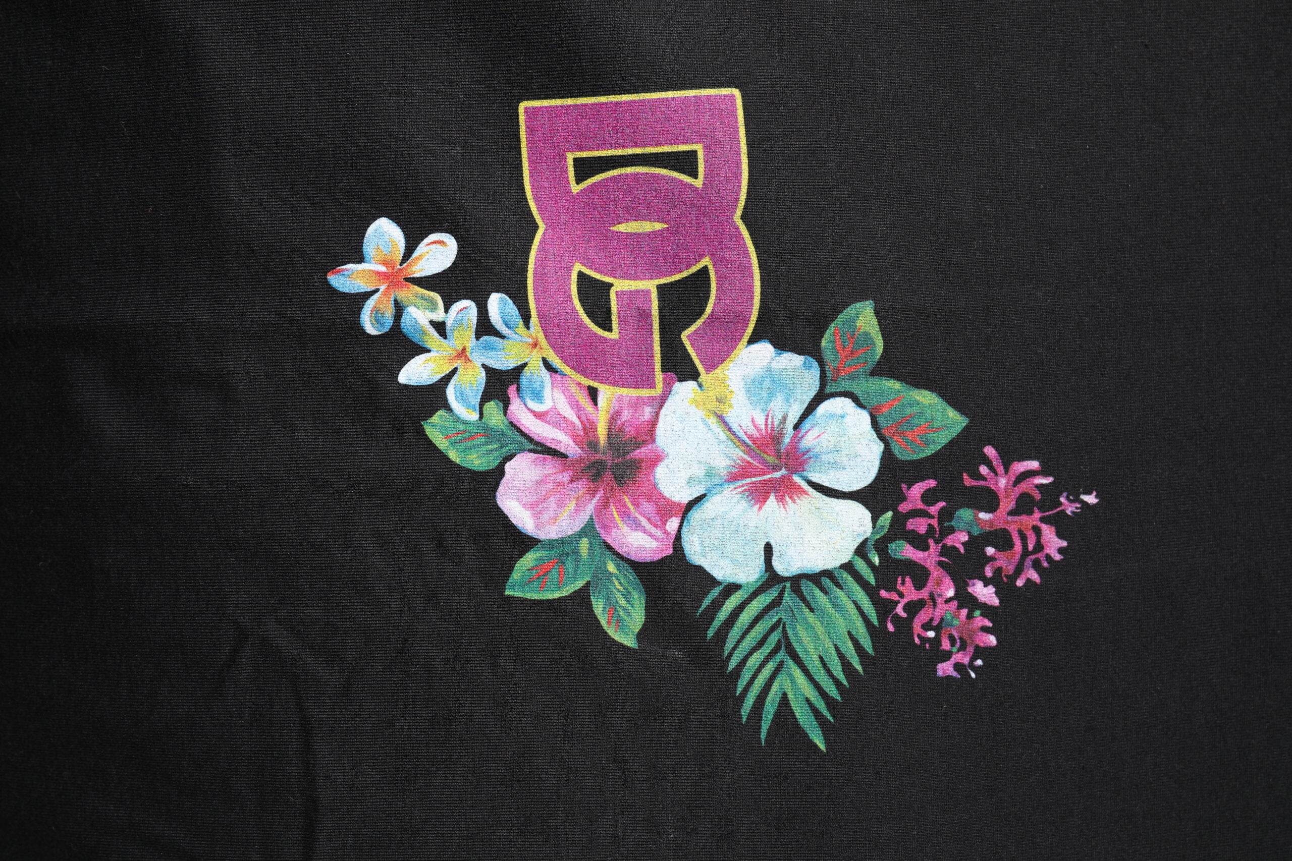 Dolce & Gabbana Schwarzes T-Shirt mit Blumenmuster und Rundhalsausschnitt