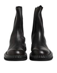 Dolce & Gabbana Schwarze kniehohe Stiefel aus Leder Flache Schuhe
