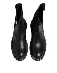 Dolce & Gabbana Schwarze kniehohe Stiefel aus Leder Flache Schuhe