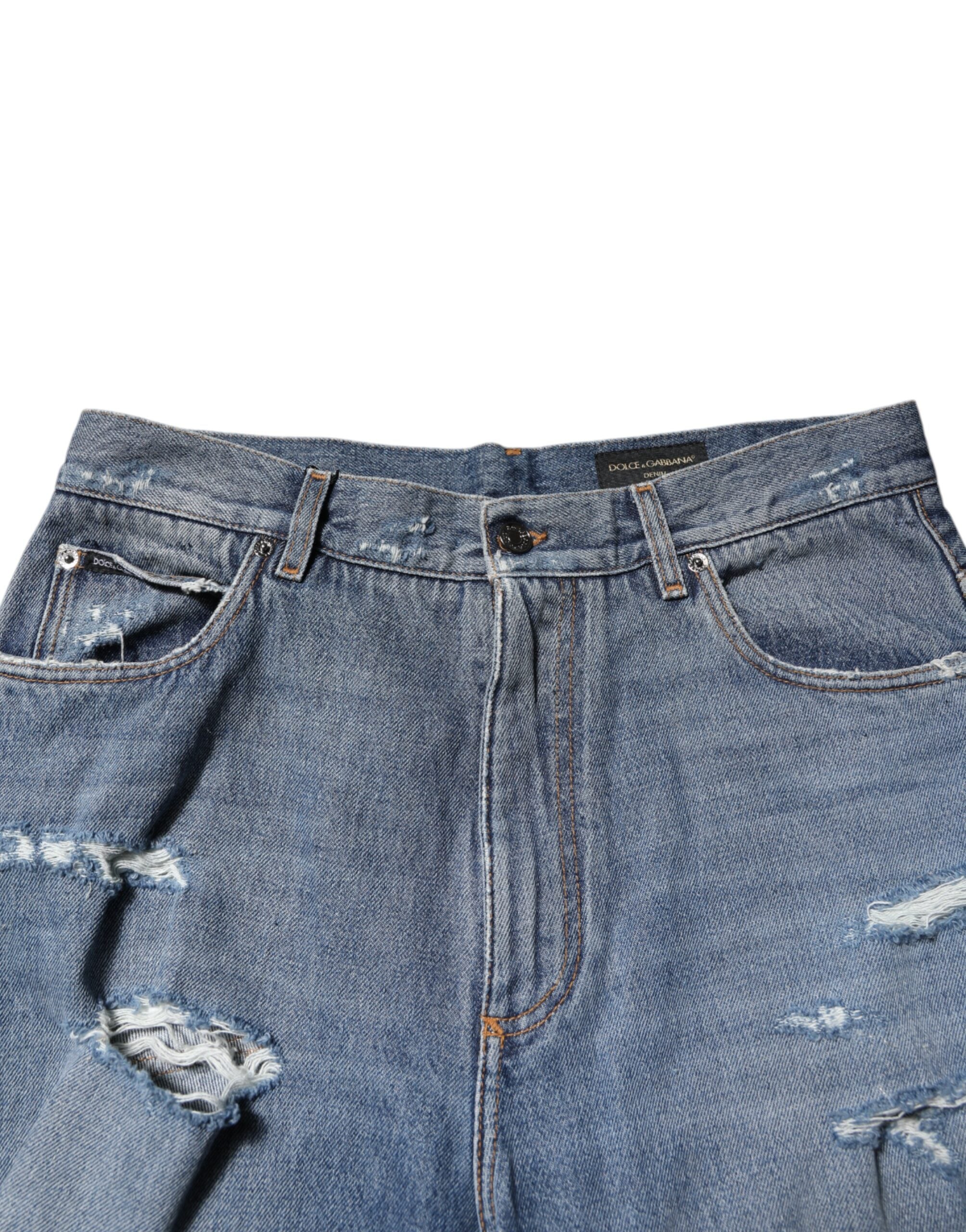 Dolce & Gabbana Blaue zerrissene Jeans aus Baumwolle mit Logo-Plakette