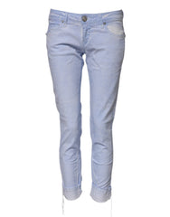 Acht lichtblauwe katoenen slim fit denim lage taille jeans