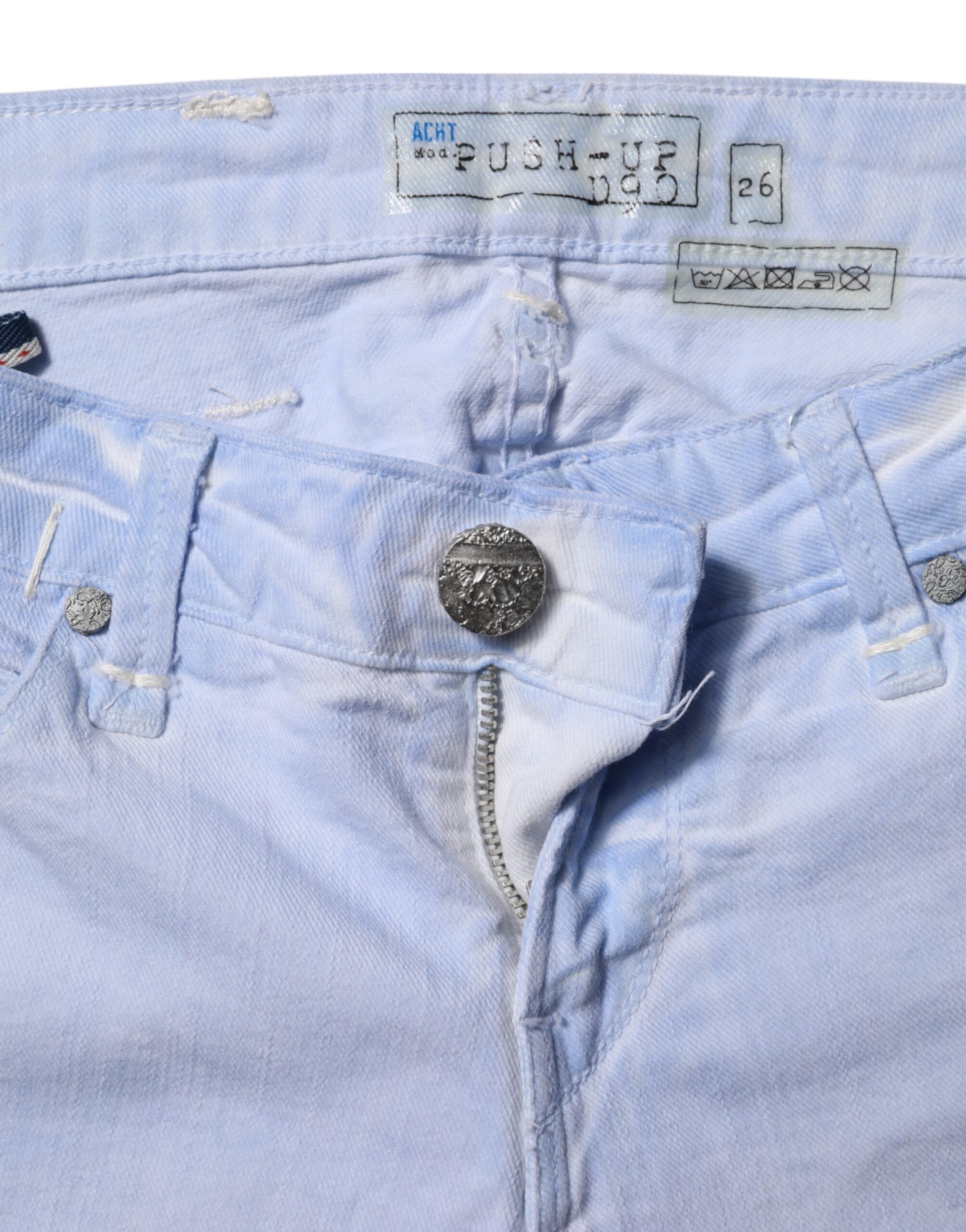 Acht lichtblauwe katoenen slim fit denim lage taille jeans