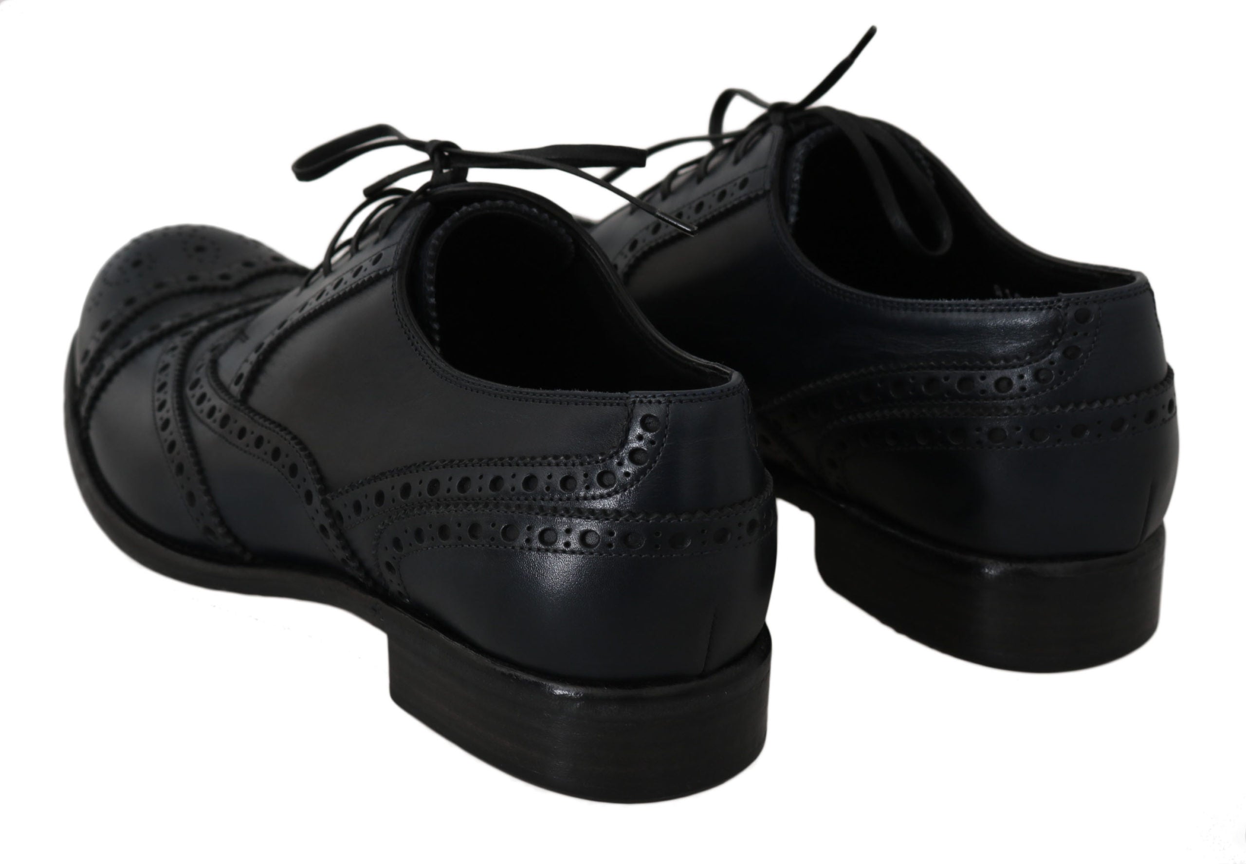Dolce & Gabbana Dunkelblaue Oxford-Slipper mit Flügelkappen aus Leder