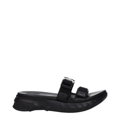 Givenchy Slipper aus schwarzem Stoff