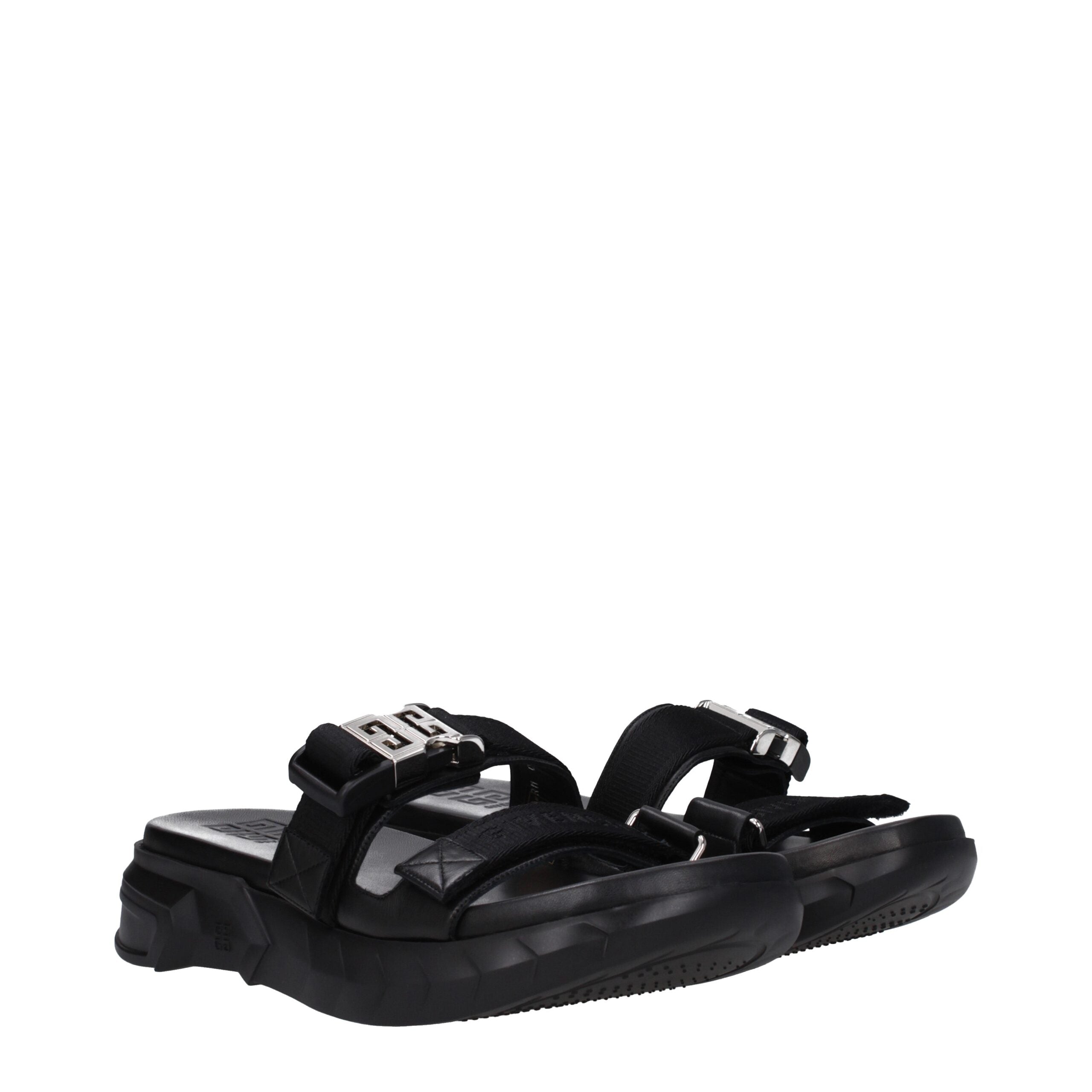 Givenchy Slipper aus schwarzem Stoff