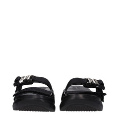 Givenchy Slipper aus schwarzem Stoff