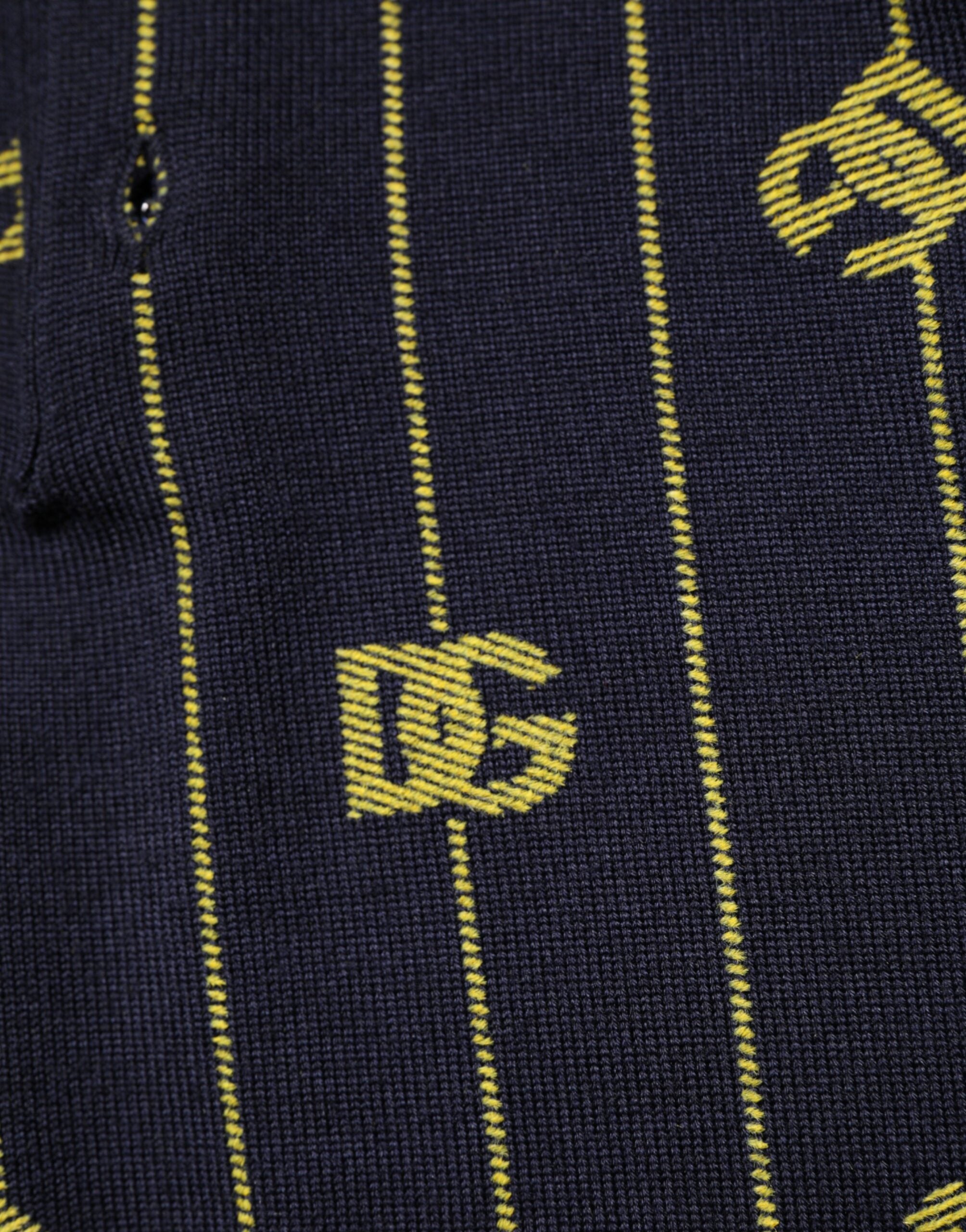 Dolce & Gabbana Schwarzes Polo-Shirt aus Logo-Jacquard-Strick