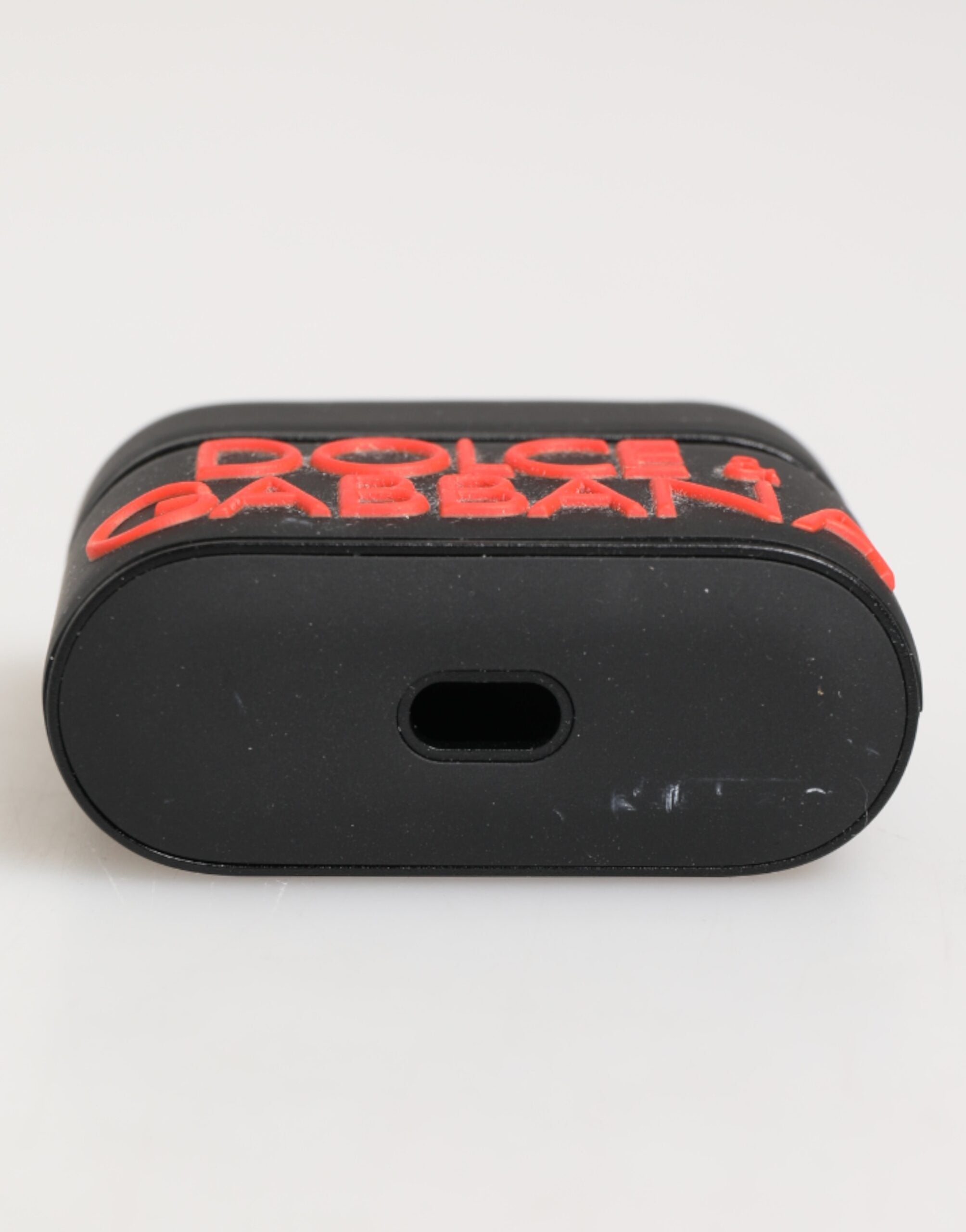 Dolce & Gabbana Schwarzes Oranges Gummi-Accessoire mit Logo-Prägung Airpods-Hülle