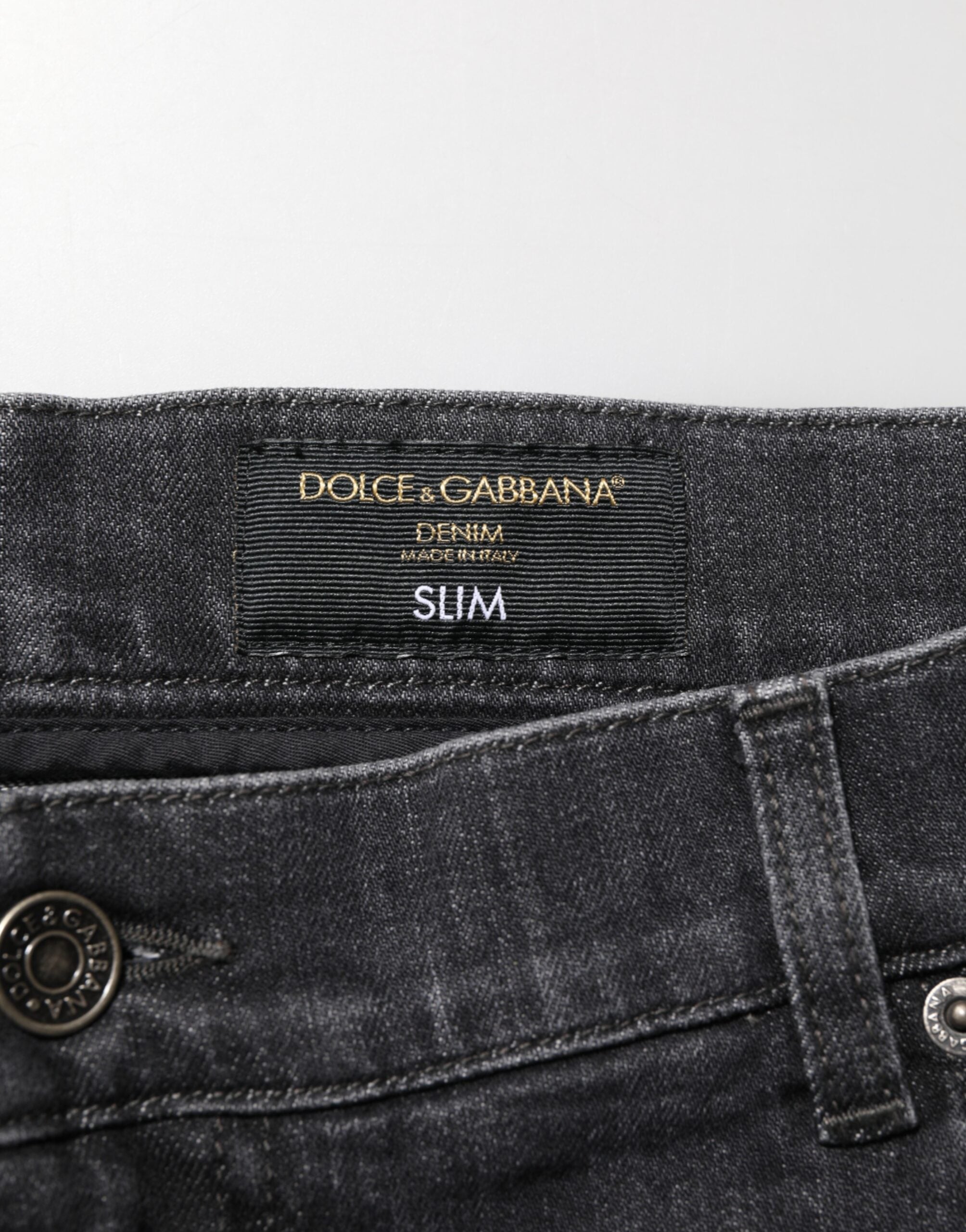 Dolce & Gabbana Schwarze Slim Fit Jeans aus Baumwolle mit Distressed-Effekten, Rissen und Logo