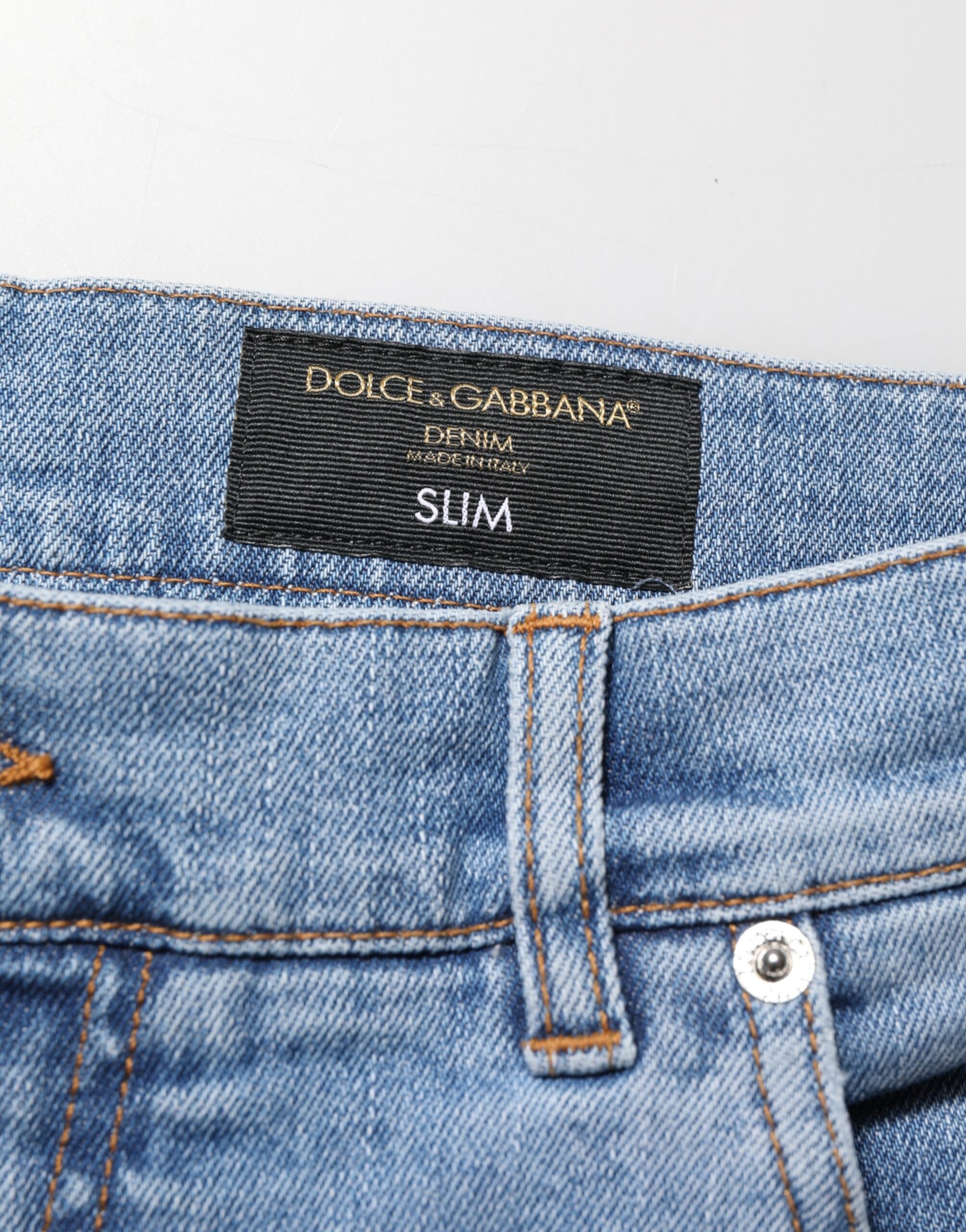 Dolce & Gabbana Blaue zerrissene Slim Fit Jeans aus Baumwoll-Denim