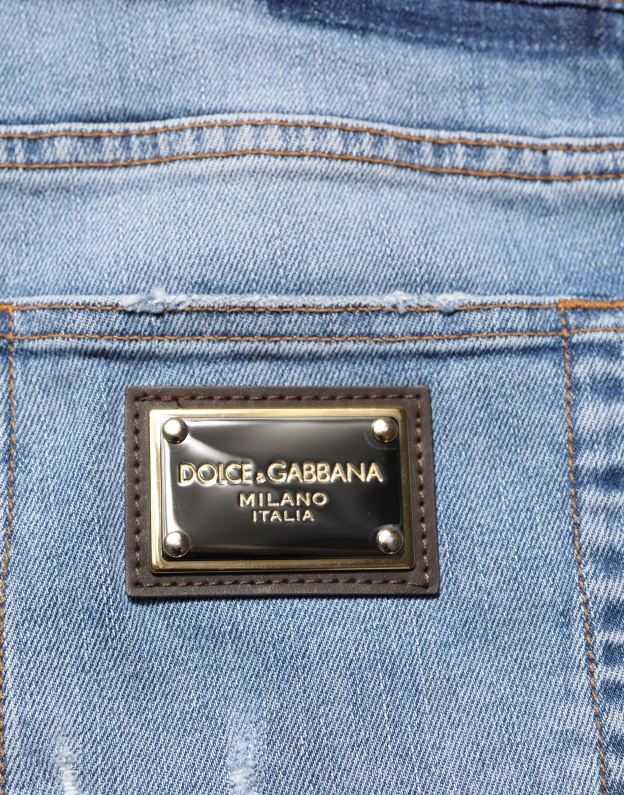 Dolce & Gabbana Blaue zerrissene Slim Fit Jeans aus Baumwoll-Denim