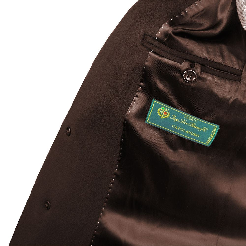 Close-up of a brown fabric with a brand label on a white background