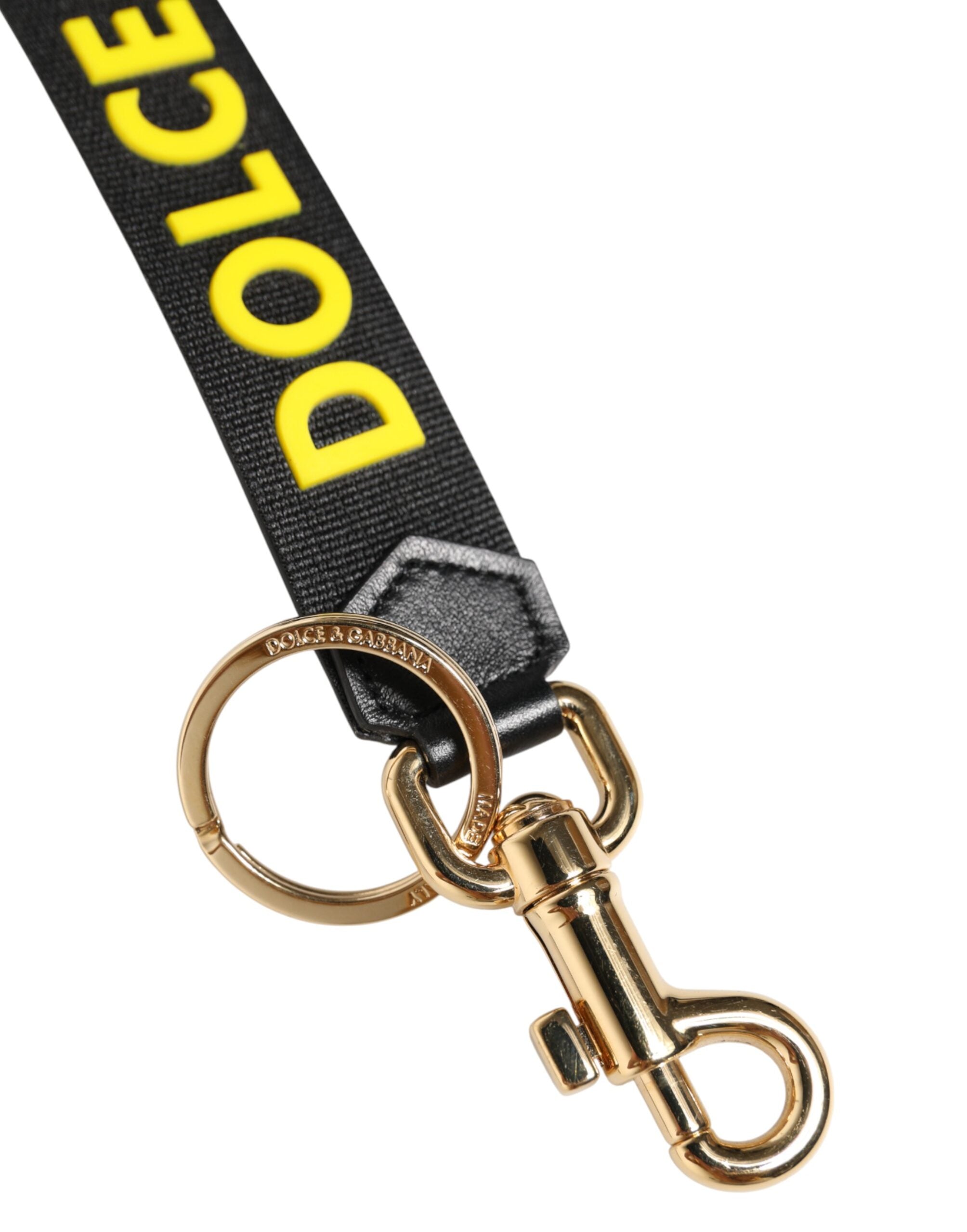 Dolce & Gabbana Schlüsselanhänger aus schwarzem und gelbem Leder mit Logo aus Messing