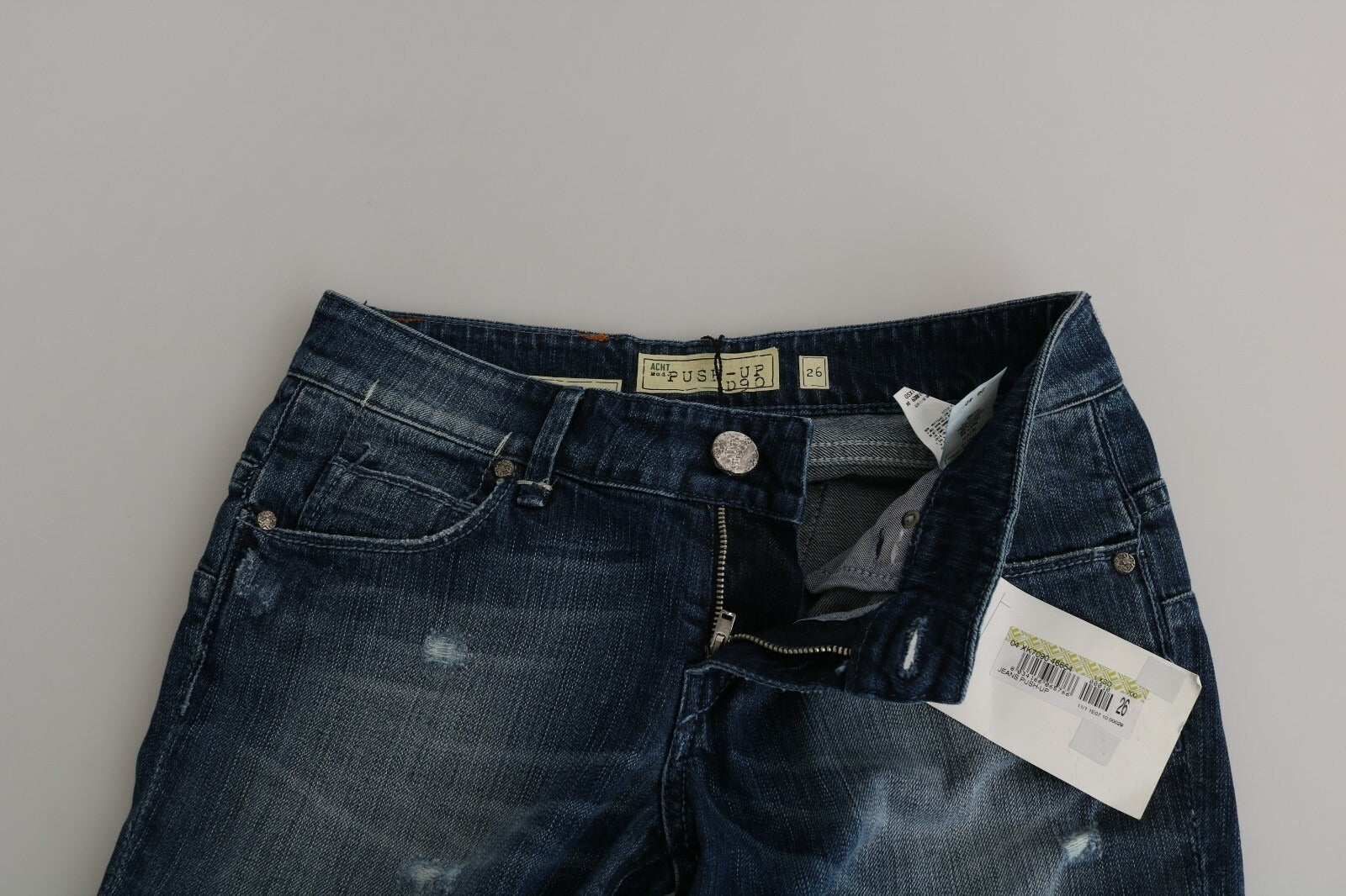 Acht baumwollene, hellblaue, ausgewaschene, tief sitzende Skinny Cropped Jeans