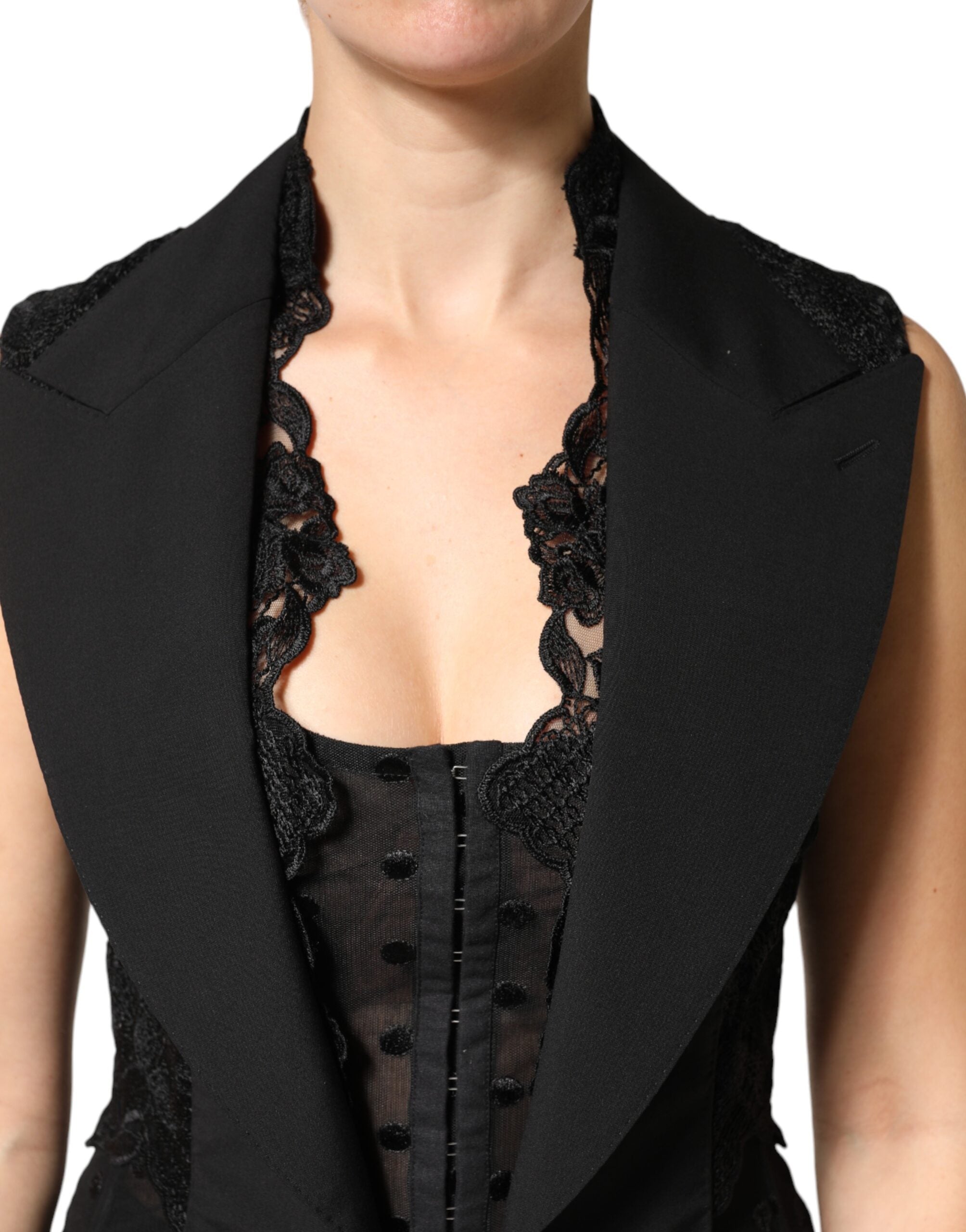 Dolce & Gabbana Schwarze Spitzenweste mit V-Ausschnitt, geschlitztem Saum und geraffter Taille