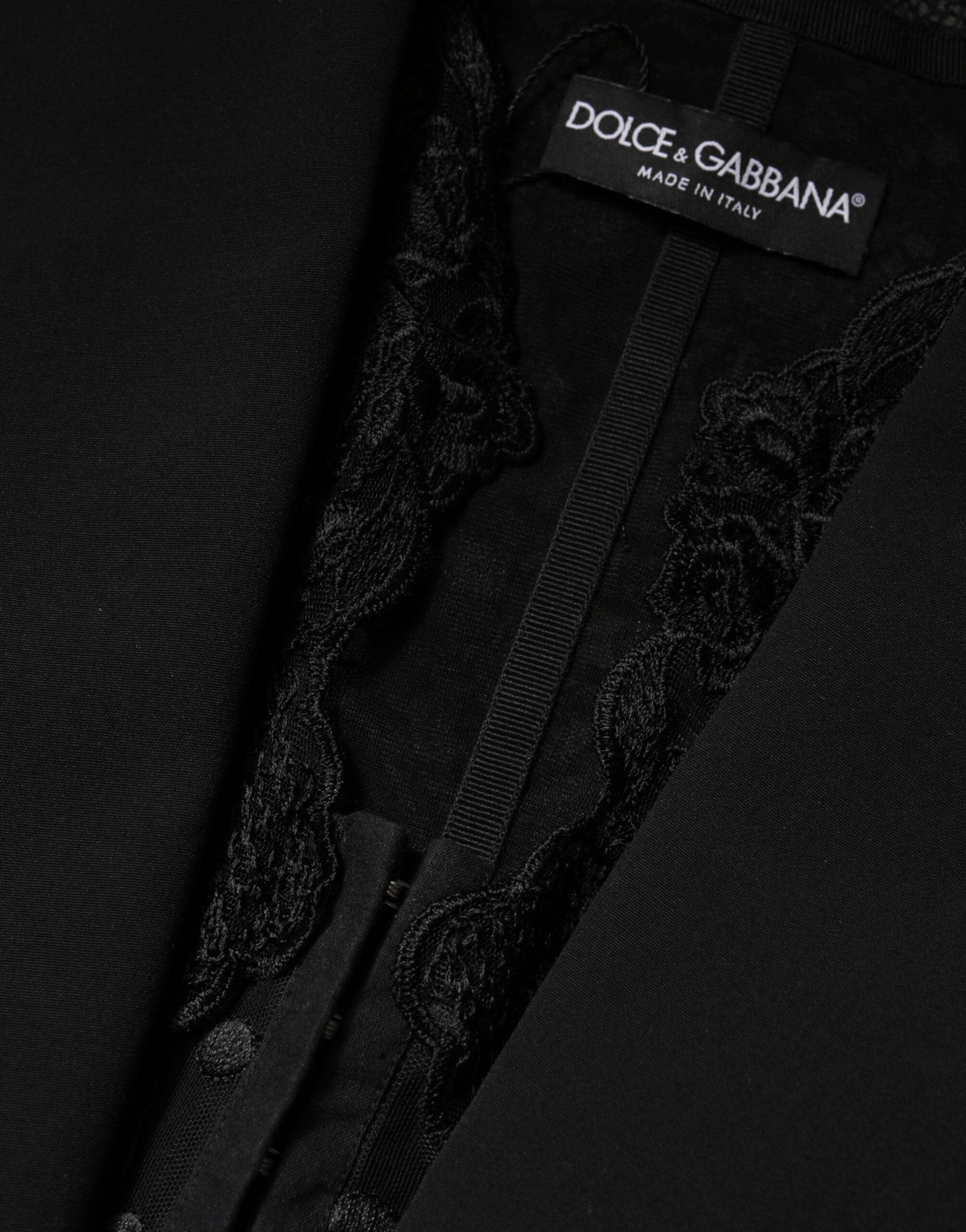 Dolce & Gabbana Schwarze Spitzenweste mit V-Ausschnitt, geschlitztem Saum und geraffter Taille
